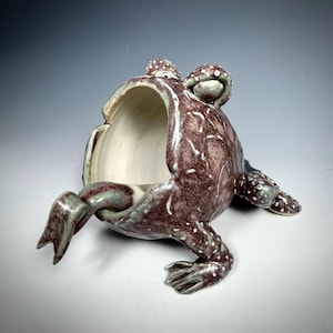 Sugar bowl or Salt Cellar in the shape of a frog with a "tongue" spoon. Stoneware ceramic handmade and handsculpted with a beautiful deep purple glaze and and inner soft white glaze. Completely functional and fun for the table!