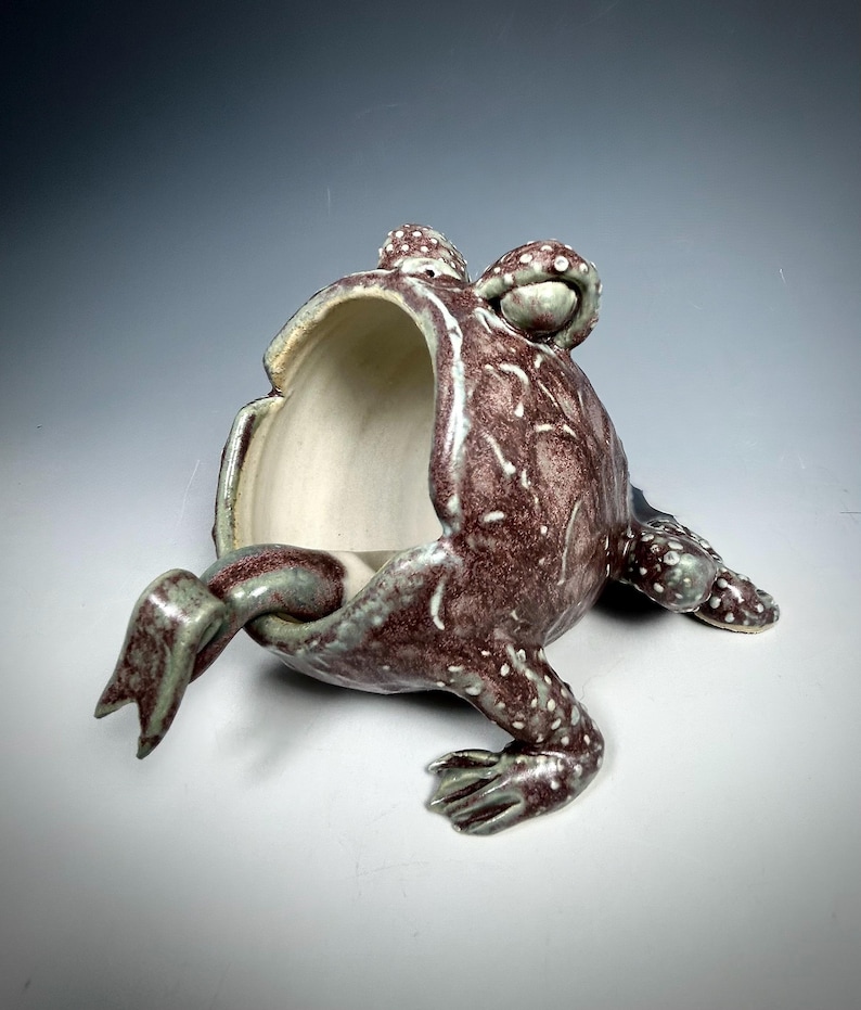 Sugar bowl or Salt Cellar in the shape of a frog with a "tongue" spoon. Stoneware ceramic handmade and handsculpted with a beautiful deep purple glaze and and inner soft white glaze. Completely functional and fun for the table!