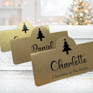 Gouden kerstplaatskaarten, gepersonaliseerde plaatskaarten, tafeldecoratie kerst, feestelijke plaatskaarten, evenement kerstfeest, aangepaste plaatskaarten