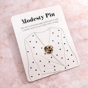 Broche de aleación de metal con nudo de modestia