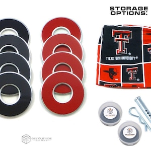 May include: A set of black and red washers with silver trim, a Texas Tech University storage bag, and game accessories. The washers are arranged in two stacks. The bag is red, black, and white.
