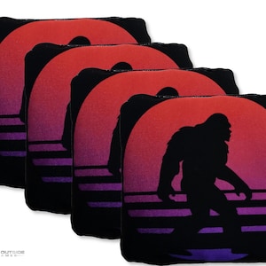 4 Bigfoot Sunset Premium Cornhole Bags | Corn or All Weather with Color Options