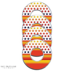 May include: Four red, white, and blue ring toss game rings with a star pattern. The rings are stacked on top of each other.