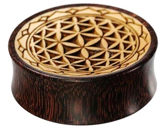 Price Per 1 Sono Wood Plug with Sterling Silver Center 12mm up to 40mm Price Per 1 Sono Wood Plug with Sterling Silver Center 12mm up to 40mm