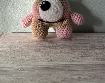 crochet pink and cream baby monster