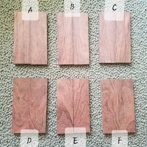May include: Six pieces of wood, labeled A through F, are arranged in two rows of three. The wood is a reddish-brown color with a natural grain pattern.