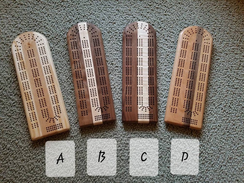 Cribbage Board with pegs and optional peg storage. Many Etsy