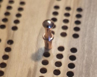 Olive 3 Track Cribbage Board with peg storage + optional text.  WARNING: Contains small parts that could be a choking hazard for children.