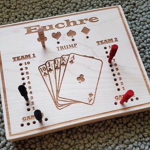 Euchre Score Board with Pegs.  WARNING:  Contains small parts that could be a choking hazard.