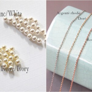 May include: Three different colored chains, silver, gold, and rose gold, on a light blue surface. The text "Argent&eacute; rhodi&eacute;", "Dor&eacute;", and "Rose gold" is written below each chain.  The text "Blanc/White" and "Ivoire/Ivory" is written on a white surface with white pearl beads.