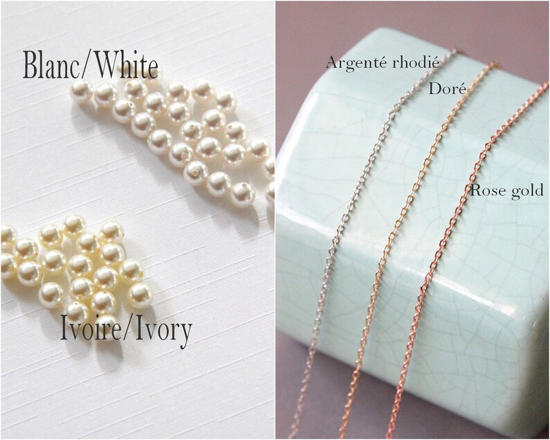 May include: Three different colored chains, silver, gold, and rose gold, on a light blue surface. The text "Argent&eacute; rhodi&eacute;", "Dor&eacute;", and "Rose gold" is written below each chain.  The text "Blanc/White" and "Ivoire/Ivory" is written on a white surface with white pearl beads.
