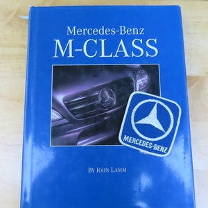 Mercedes M-Class Motorbook with OEM Mercedes Sew On Patch 1997 hardcover in dw