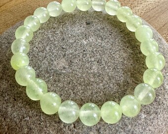 NEW! Very pale green jade bead bracelet. 8mm Smooth Beads.  Simple Stretch Cord Bracelet.