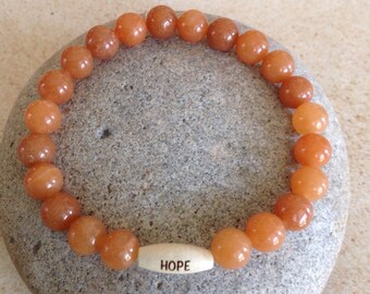 POSITIVE. HEALING. Peach Aventurine Beaded Gemstone Bracelet. Unisex. Wood "HOPE" Bead. Simple, Stretch Bracelet. Meditation/Yoga Bracelet.