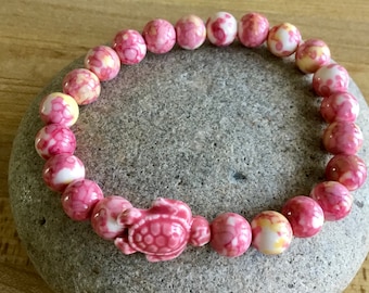 HEALING-WORRY-PROCRASTINATION  -  Pink/Yellow.  Rainbow Jasper. Pink Ceramic Turtle. Focal Bead. Simple/Stretch. Chakra. Beaded Bracelet.