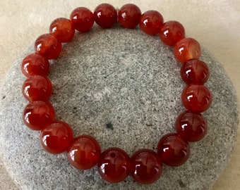 WILLPOWER - ENERGY - 10mm Carnelian Bracelet. Simple Stretch. Beaded Gemstone Bracelet. Unisex. Root/Sacral Chakra.