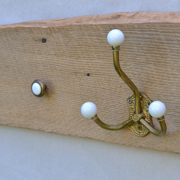 Rustic coat rack barnwood wall hanging with vintage porcelain hooks and knobs