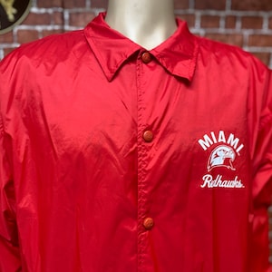 Miami Redhawks Football red windbreaker jacket size large made by Champion.
