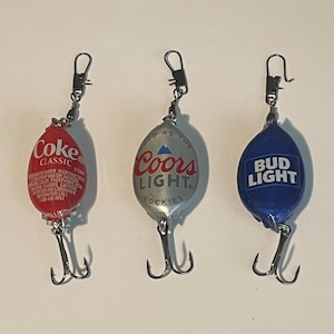 One Bud Light, one Coke, and one Coors Light bottle cap fishing lures