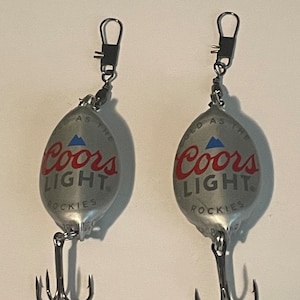 Two Coors Light bottle cap fishing lures