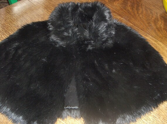 black faux fur shoulder cape