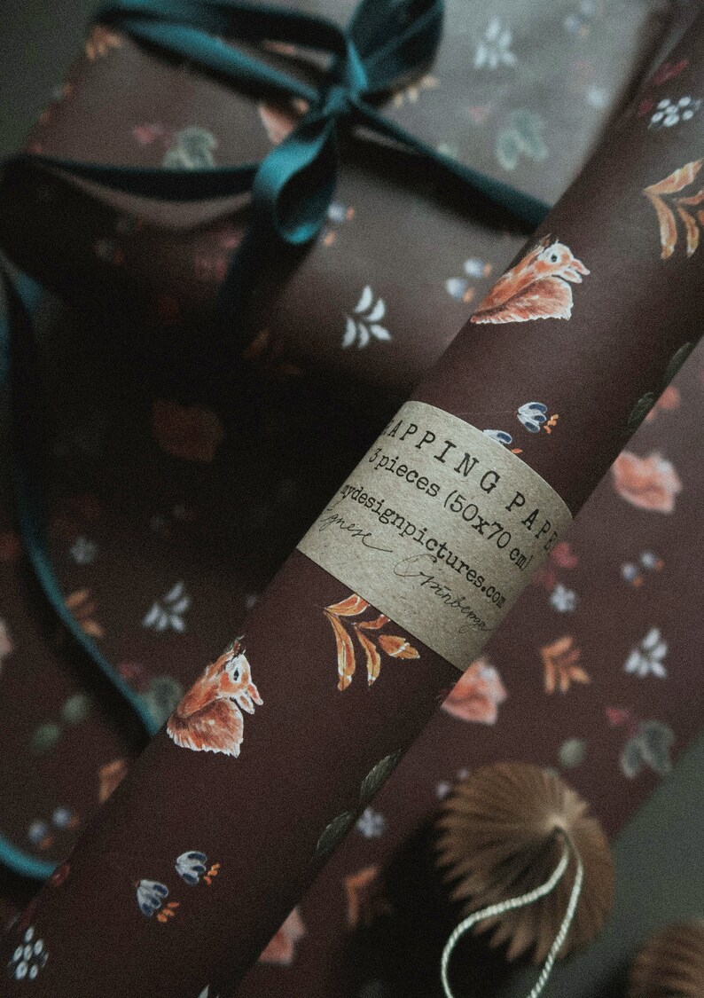 May include: A roll of brown wrapping paper with a white squirrel and floral pattern. The paper is labeled "Wrapping Paper 5 pieces (50x70 cm) ydesignpictures.com".
