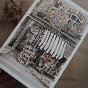 Rue avec des fleurs, carte d'anniversaire, carte de voeux, carte d'anniversaire illustrée, magasin de fleurs, aquarelle, carte d'art, carte aquarelle