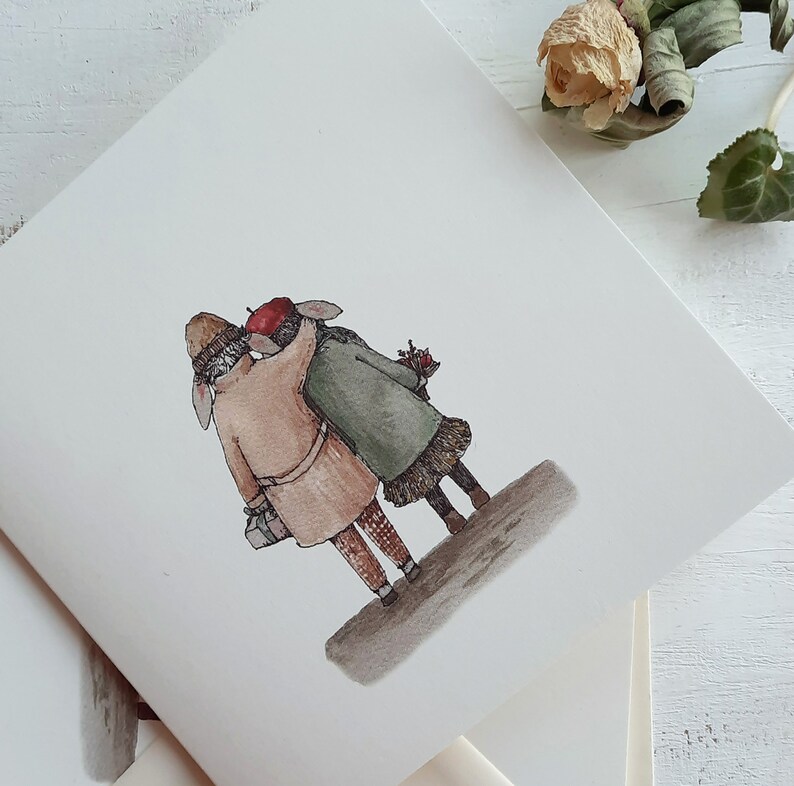 May include: A watercolor illustration of two figures walking side-by-side. The figure on the left is wearing a brown coat, a brown hat, and a red scarf. The figure on the right is wearing a green coat, a red beret, and a brown skirt. They are both holding hands and walking away from the viewer.