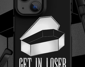May include: A black smartphone case featuring a white graphic of an open coffin and the text GET IN LOSER printed in a bold, stylized font. The design is centered on the back of the case, which displays a dual-camera cutout at the top left corner.