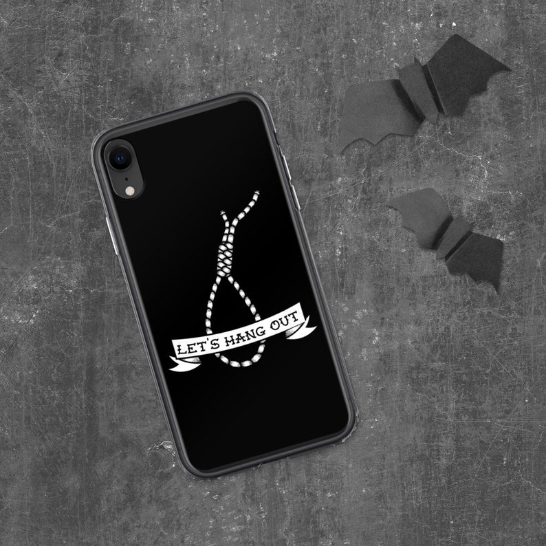 May include: Black phone case with a white graphic of a noose and the text "Let's Hang Out".