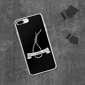 May include: Black phone case with a white graphic of a noose and the text "Let's Hang Out".