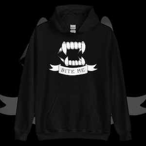 May include: Black hooded sweatshirt with a white graphic of a set of fangs and the text "Bite Me".