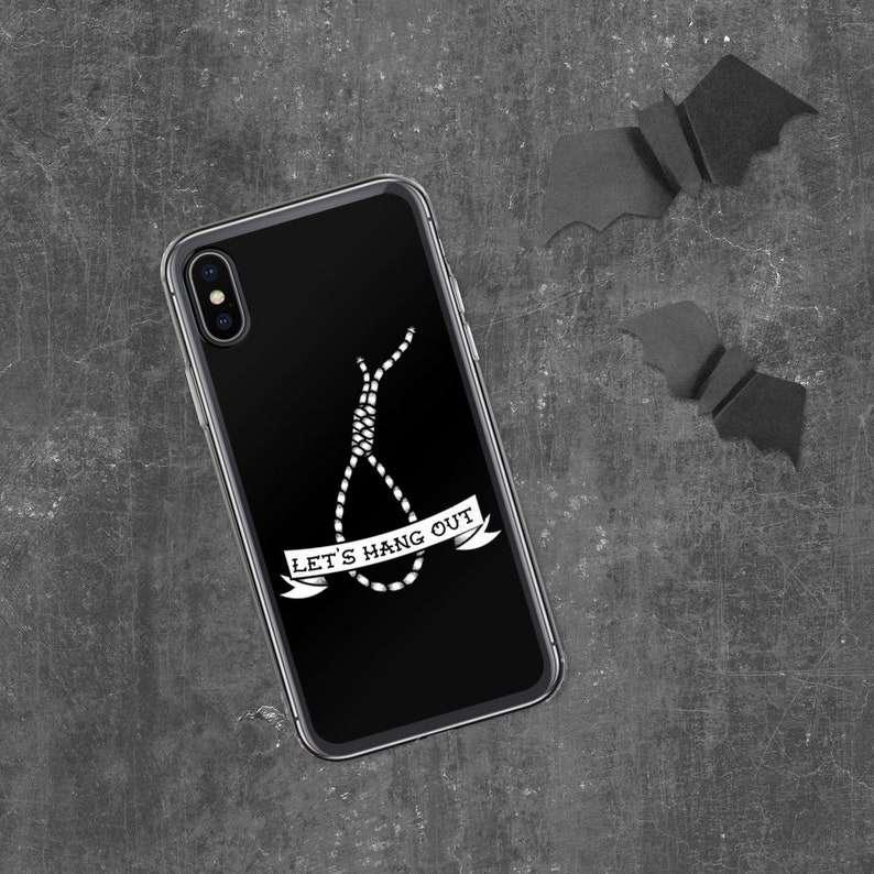 May include: Black phone case with a white illustration of a noose and the text "Let's Hang Out".