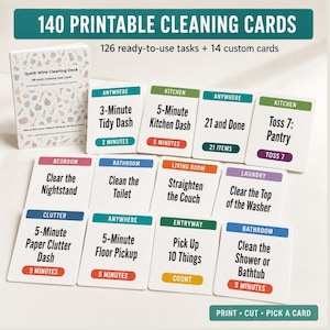 May include: A set of 140 printable cleaning cards including 126 ready-to-use tasks and 14 custom cards. The deck box and individual cards feature text such as 3-Minute Tidy Dash, 5-Minute Kitchen Dash, 21 and Done, and Toss 7: Pantry in various colors.