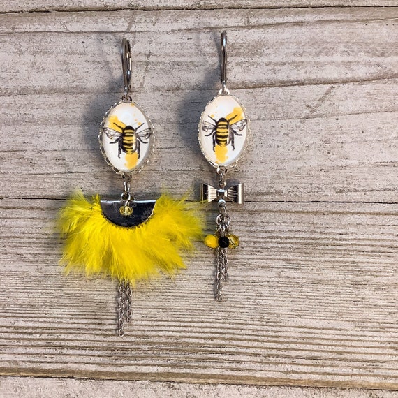 Asymetric feather long earrings yellow bee