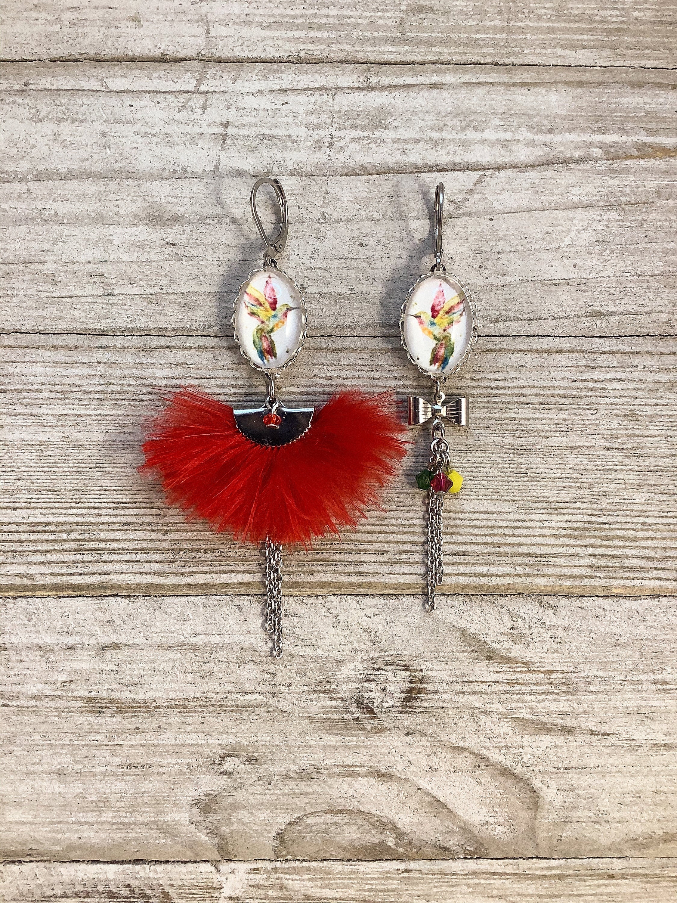 Bird shop feather earrings