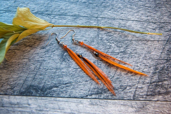 Pendant asymmetric earring long orange feathers on inox chain