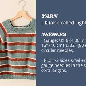 May include: A striped knitted top with short sleeves, hanging on a wooden hanger. The top is made with DK yarn, also known as Light #3. The knitting needles recommended are US 6 (4.00 mm) for the main fabric and 1-2 sizes smaller for the ribbing.