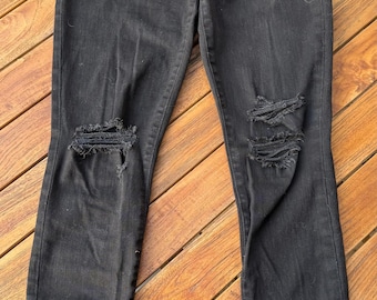 Joes jeans.  Skinny leg. Distressed knees. Size 28   Black.