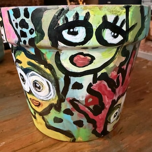 Funky faces handpainted flower pot