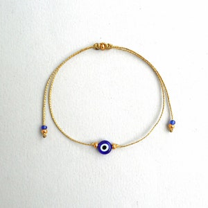 Gold string Evil Eye Bracelet, Mother&#39;s gift, 24k Gold plated beads Minimalist Blue Eye Lucky Bracelet Protection Greek Mati Good luck