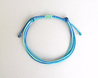 Pulsera azul surfista, cordón encerado impermeable, joyería playera, pulsera de hilo ajustable.
