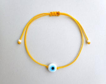 Evil eye bracelet, Yellow string bracelet, White glass bead Unisex Adjustable Simple Minimal Lucky amulet Good luck Stacking Spiritual gifts