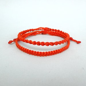 Pumpkin Orange Macrame Bracelet: Adjustable Boho Chic Woven Cord