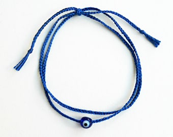 Blue evil eye Braided silk thread bracelet Round glass bead, Minimalist, Wrist wraps Layer, Tie on closure, Unisex, Lucky, Spiritual gifts