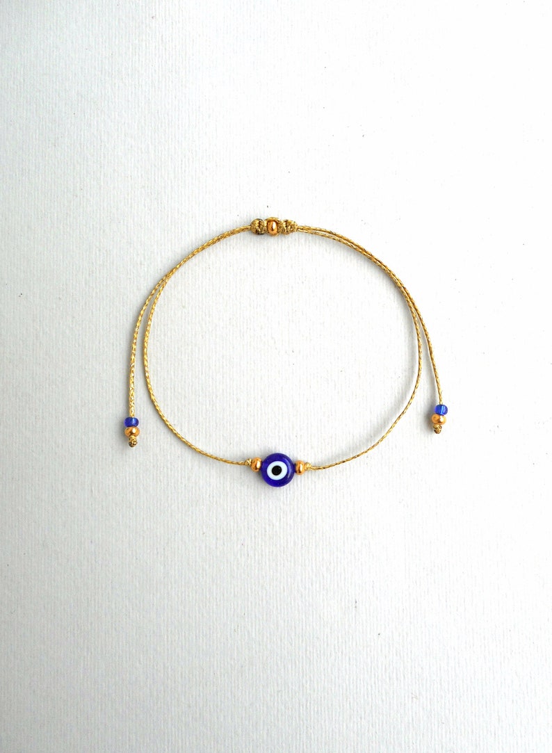 Gold string Evil Eye Bracelet 24k Gold plated beads Minimalist Blue Eye Lucky Bracelet Protection Greek jewelry Good luck gift Wish bracelet Gold