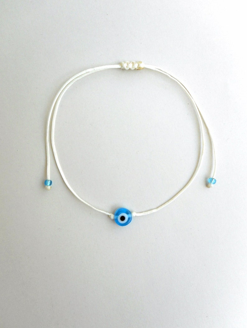 Light blue evil eye Minimalist bracelet, Kabbalah red string, Simplicity Unisex Adjustable Good luck Mommy and me Stacking spiritual jewelry White