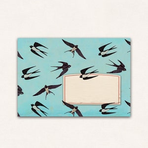 10 envelopes with swallows