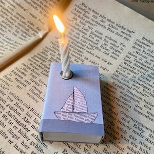 Schachtellicht mit Segelboot