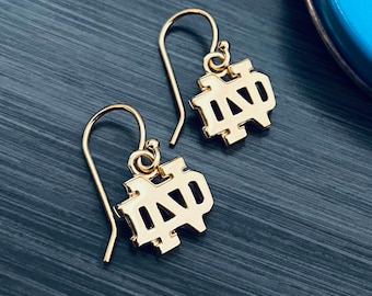 University of Notre Dame Dangle Earrings - Gold Plated - OFFICIALLY LICENSED Collegiate Product by Dayna Designs